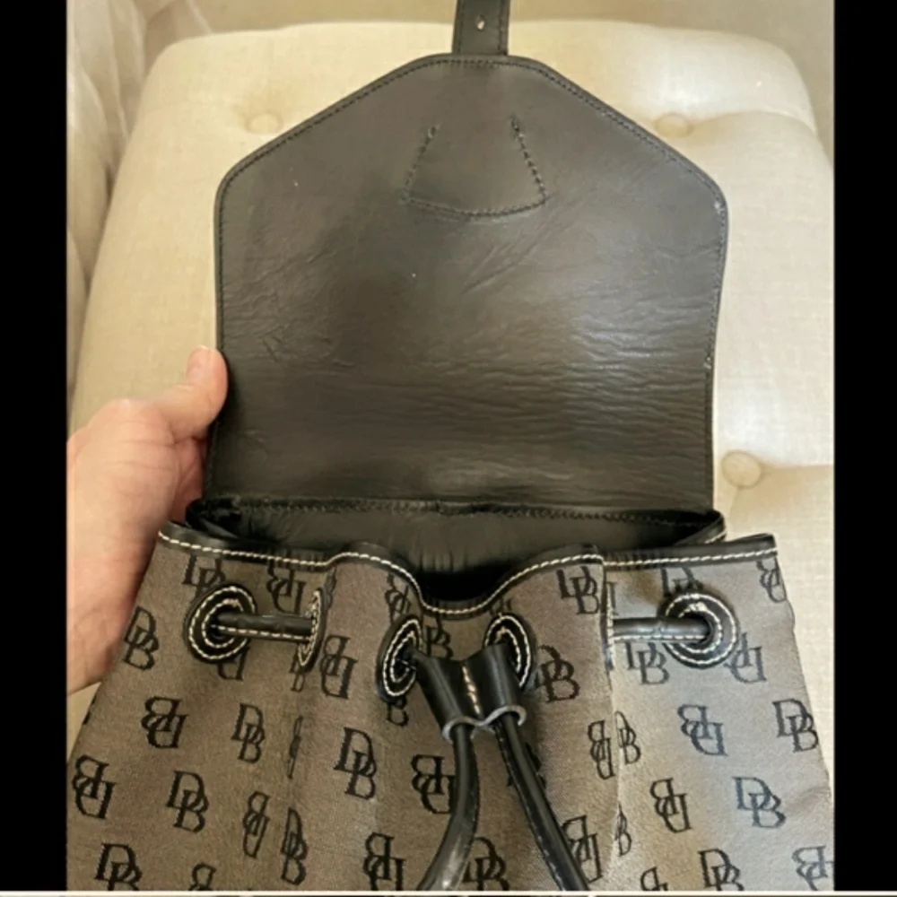 Vtg Dooney & Bourke signature monogram canvas leather backpack